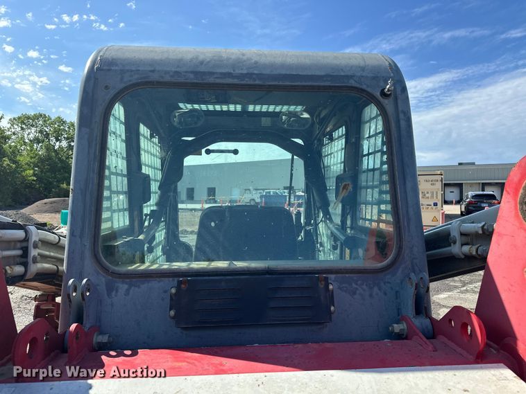image for item ES6504 2012 Takeuchi TL250 tracked skid steer loader