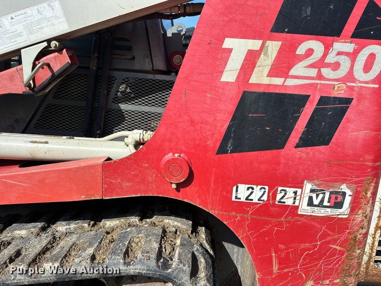image for item ES6504 2012 Takeuchi TL250 tracked skid steer loader