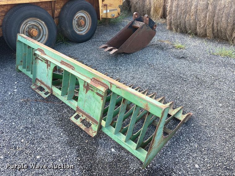 Skid steer and backhoe buckets