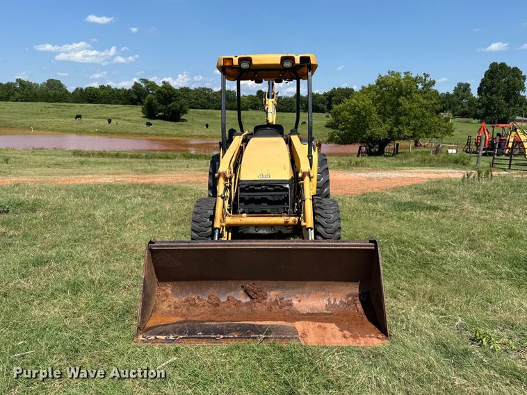 image for item ET6457 2004 John Deere 110 backhoe