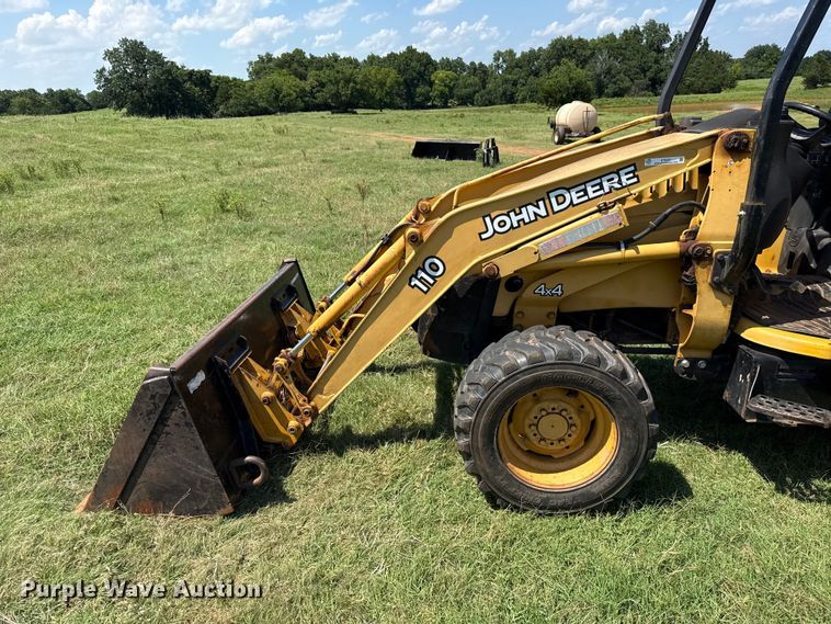 image for item ET6457 2004 John Deere 110 backhoe