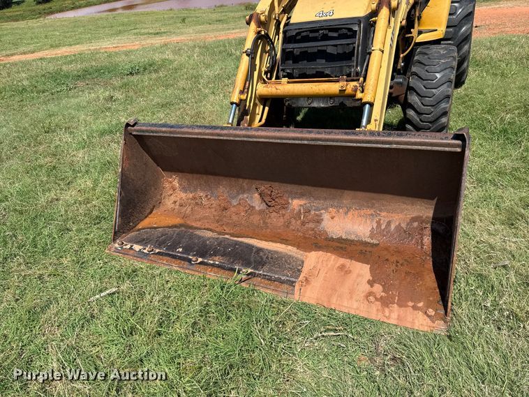 image for item ET6457 2004 John Deere 110 backhoe