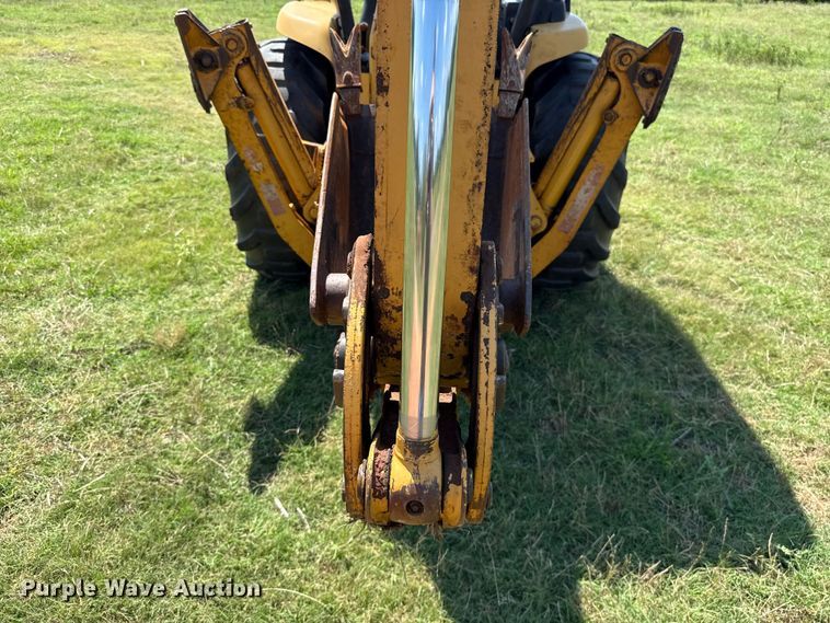 image for item ET6457 2004 John Deere 110 backhoe