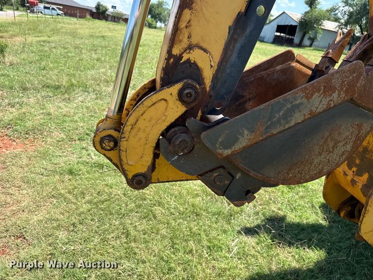 image for item ET6457 2004 John Deere 110 backhoe