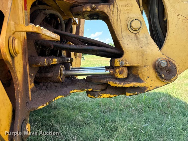 image for item ET6457 2004 John Deere 110 backhoe