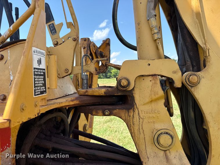 image for item ET6457 2004 John Deere 110 backhoe