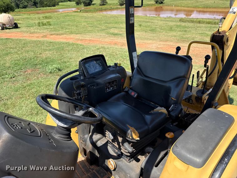 image for item ET6457 2004 John Deere 110 backhoe