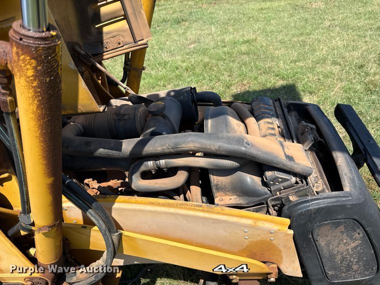 image for item ET6457 2004 John Deere 110 backhoe