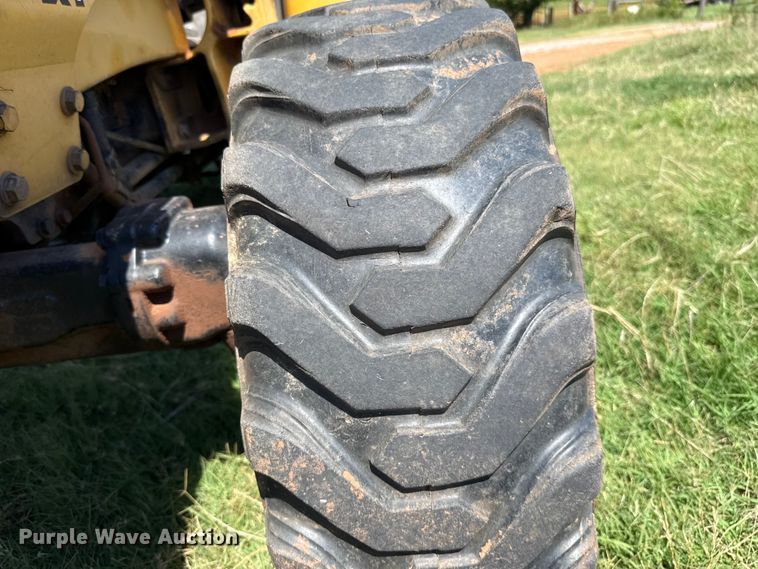 image for item ET6457 2004 John Deere 110 backhoe