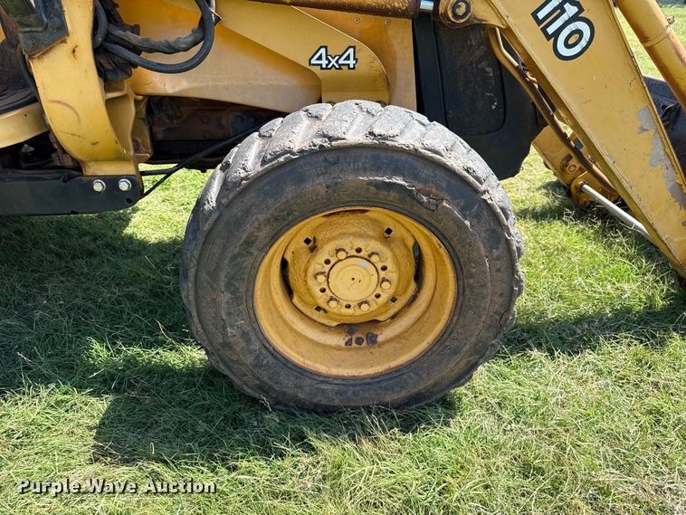 image for item ET6457 2004 John Deere 110 backhoe