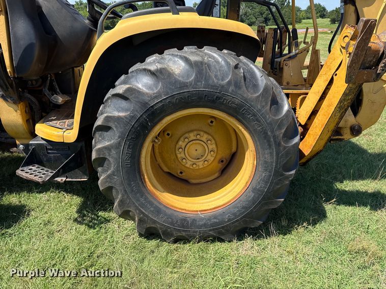image for item ET6457 2004 John Deere 110 backhoe