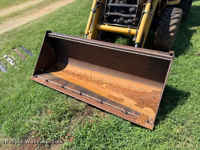 image for item ET6458 2006 John Deere 110 backhoe