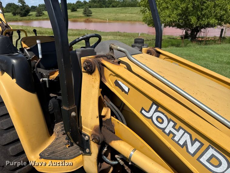 image for item ET6458 2006 John Deere 110 backhoe