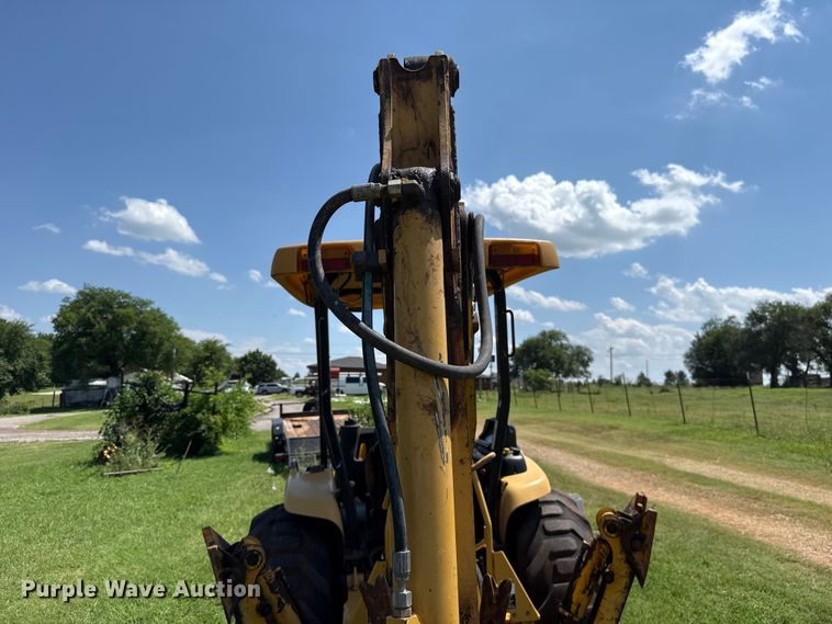 image for item ET6458 2006 John Deere 110 backhoe
