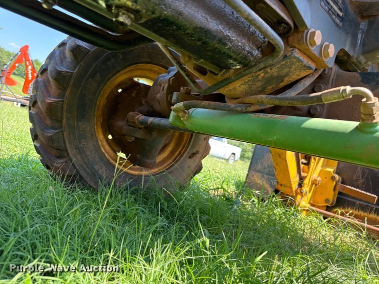 image for item ET6458 2006 John Deere 110 backhoe