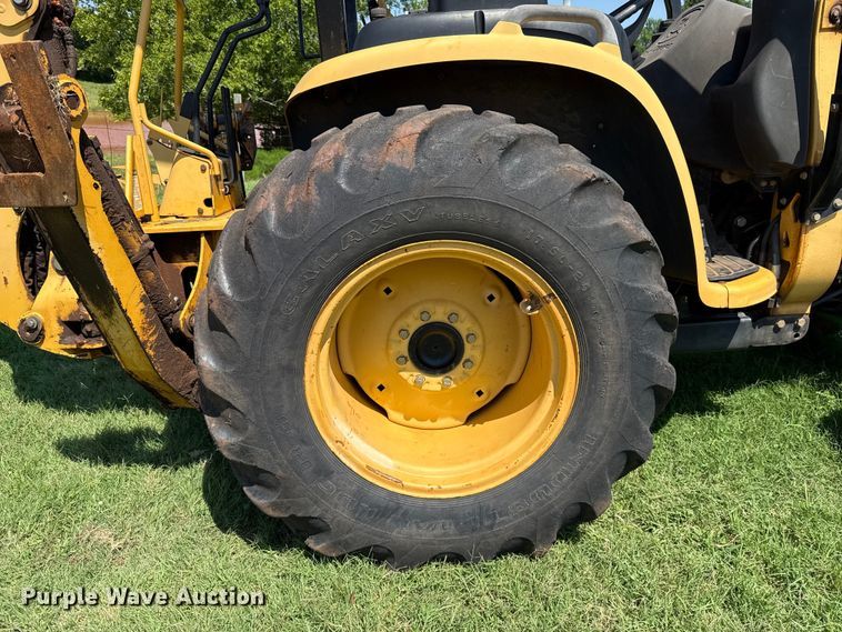 image for item ET6458 2006 John Deere 110 backhoe