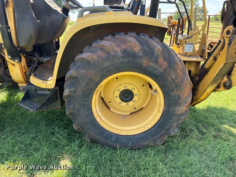 image for item ET6458 2006 John Deere 110 backhoe