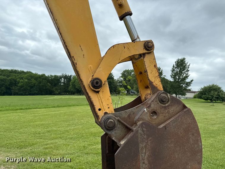 image for item FB5741 1999 New Holland 555E backhoe
