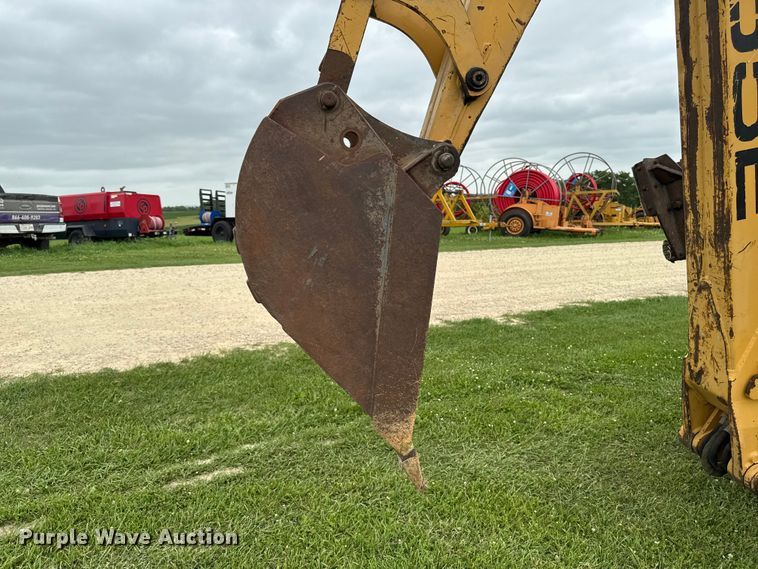 image for item FB5741 1999 New Holland 555E backhoe