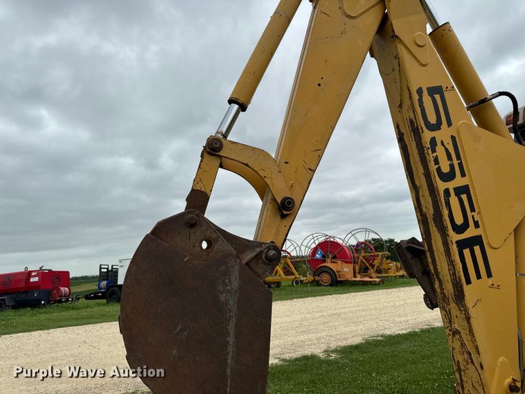 image for item FB5741 1999 New Holland 555E backhoe
