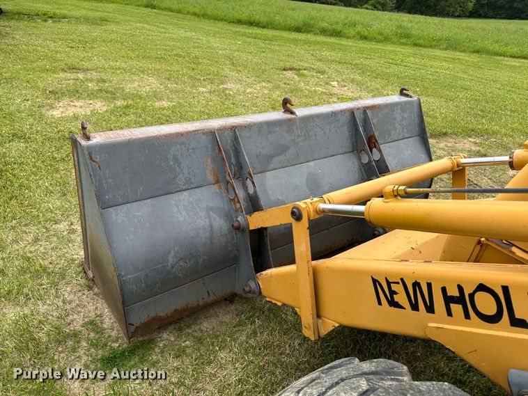 image for item FB5741 1999 New Holland 555E backhoe