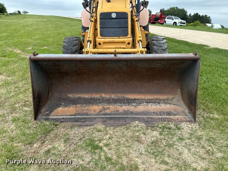 image for item FB5741 1999 New Holland 555E backhoe