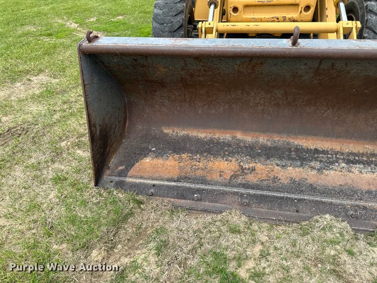 image for item FB5741 1999 New Holland 555E backhoe