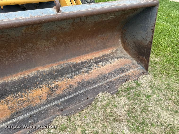 image for item FB5741 1999 New Holland 555E backhoe