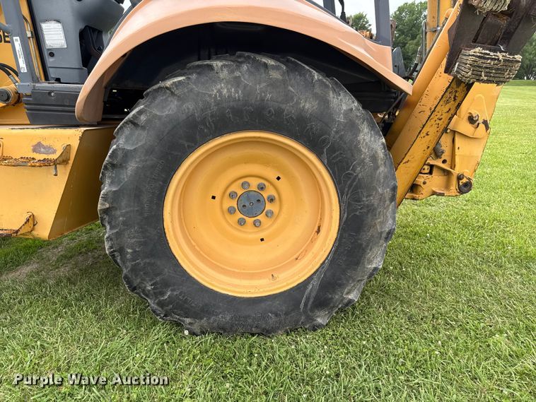 image for item FB5741 1999 New Holland 555E backhoe