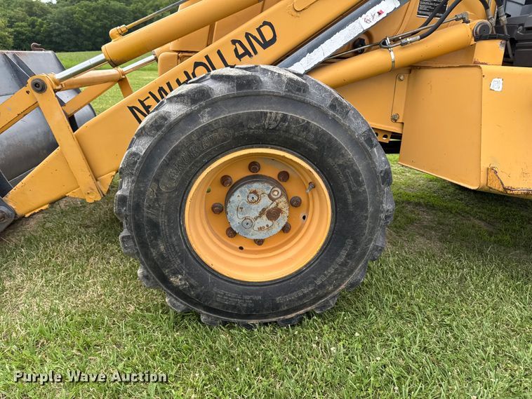 image for item FB5741 1999 New Holland 555E backhoe