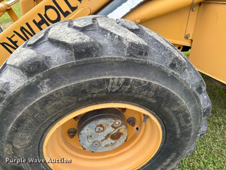 image for item FB5741 1999 New Holland 555E backhoe