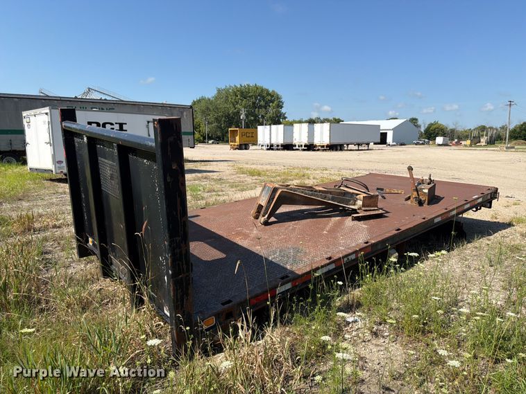 Tilting flat bed