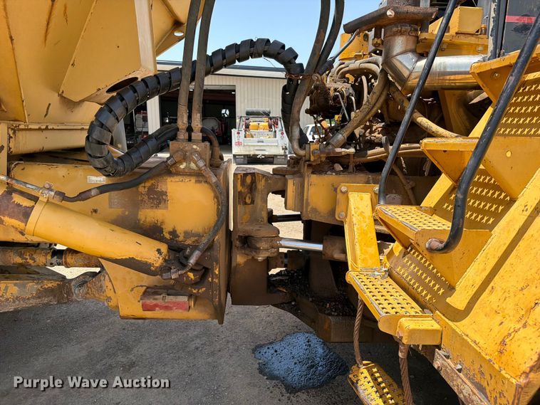 image for item FI0261 2000 Caterpillar D250E Series II articulated haul truck