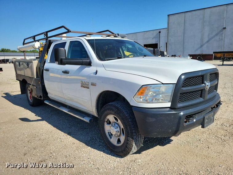 image for item FU0032 2018 RAM 2500 Crew Cab flatbed pickup truck
