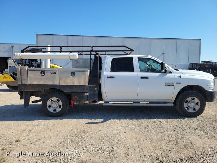 image for item FU0032 2018 RAM 2500 Crew Cab flatbed pickup truck
