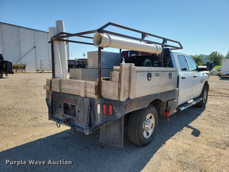 image for item FU0032 2018 RAM 2500 Crew Cab flatbed pickup truck