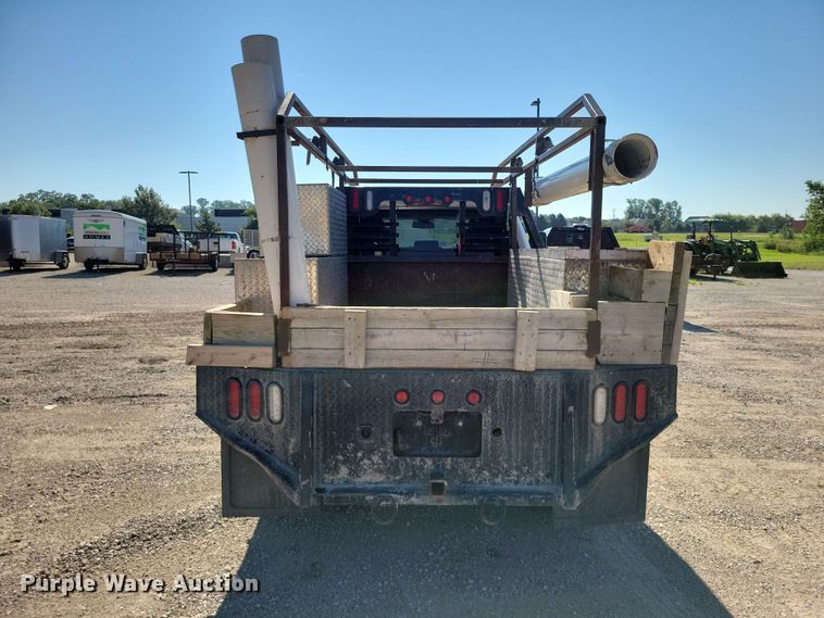 image for item FU0032 2018 RAM 2500 Crew Cab flatbed pickup truck