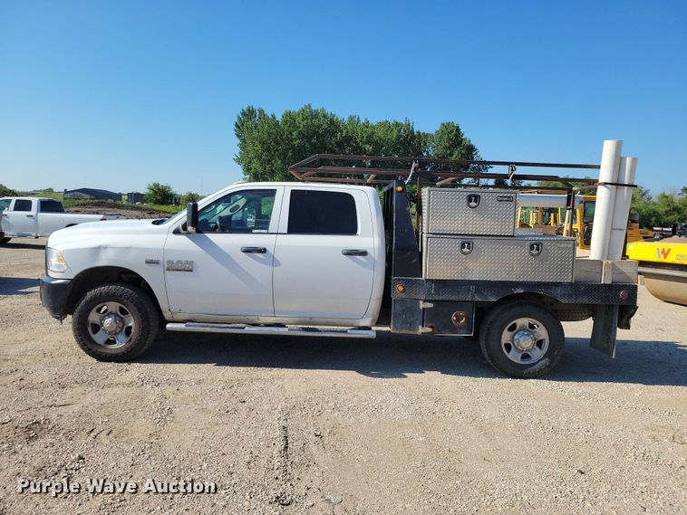 image for item FU0032 2018 RAM 2500 Crew Cab flatbed pickup truck