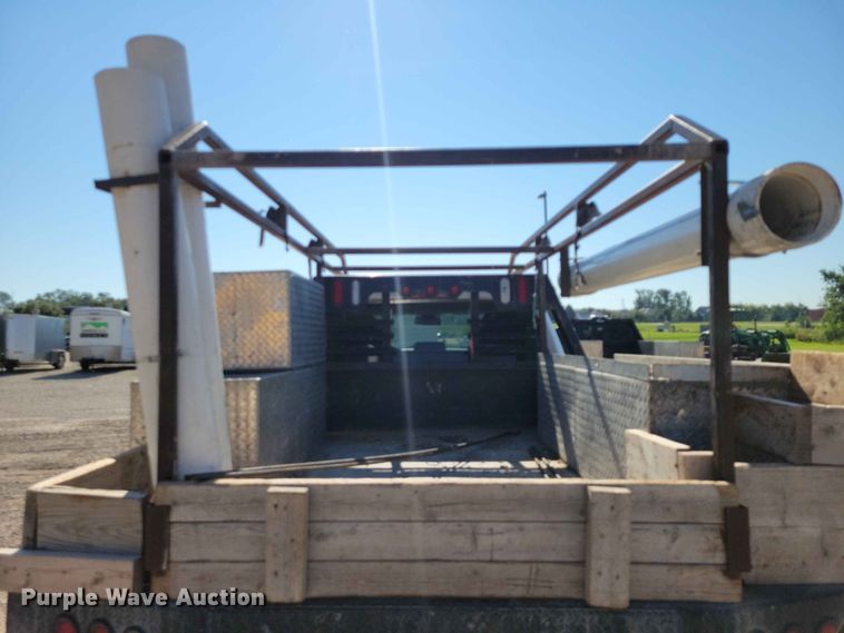 image for item FU0032 2018 RAM 2500 Crew Cab flatbed pickup truck