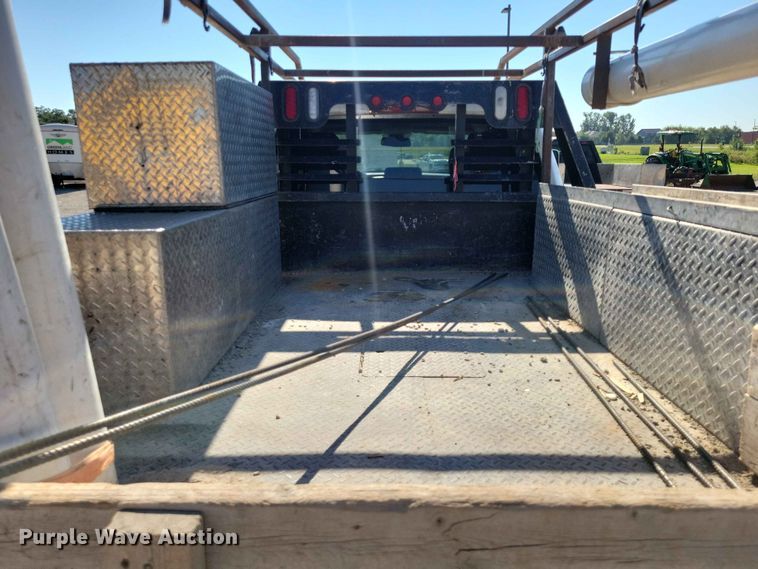 image for item FU0032 2018 RAM 2500 Crew Cab flatbed pickup truck