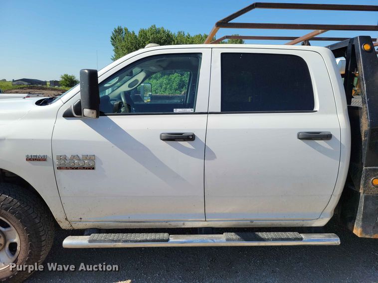 image for item FU0032 2018 RAM 2500 Crew Cab flatbed pickup truck