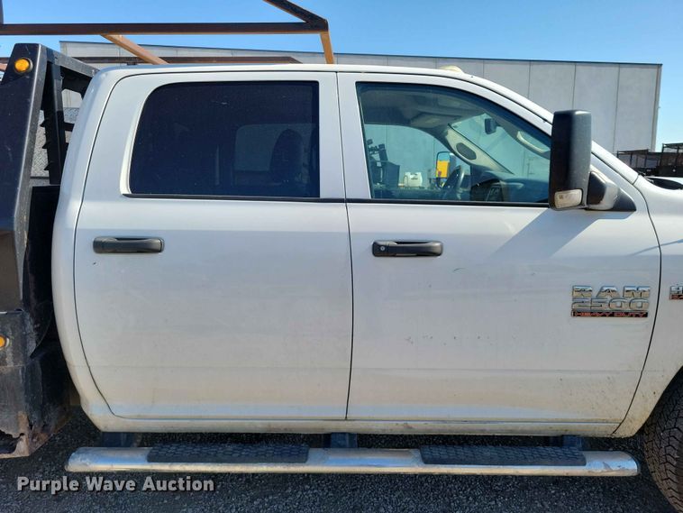 image for item FU0032 2018 RAM 2500 Crew Cab flatbed pickup truck