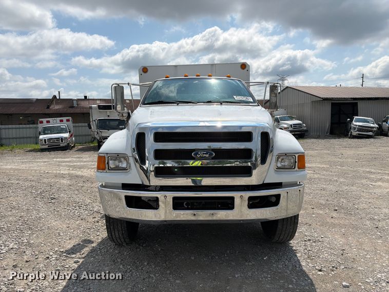 image for item YA3709 2015 Ford F650 Super Duty Ext. Cab chipper truck