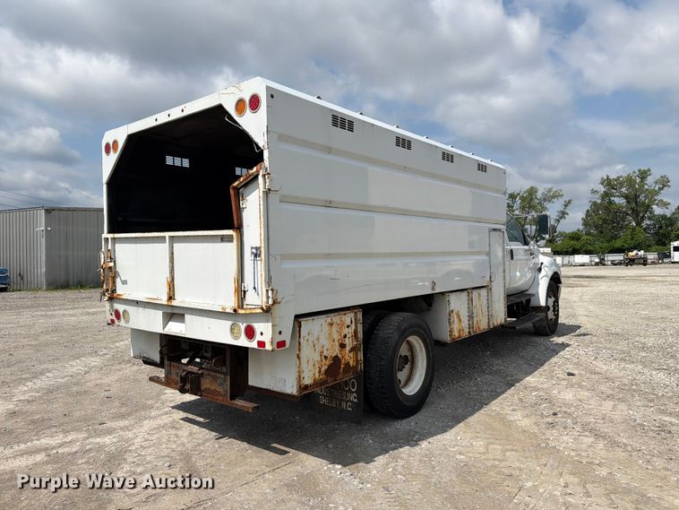 image for item YA3709 2015 Ford F650 Super Duty Ext. Cab chipper truck