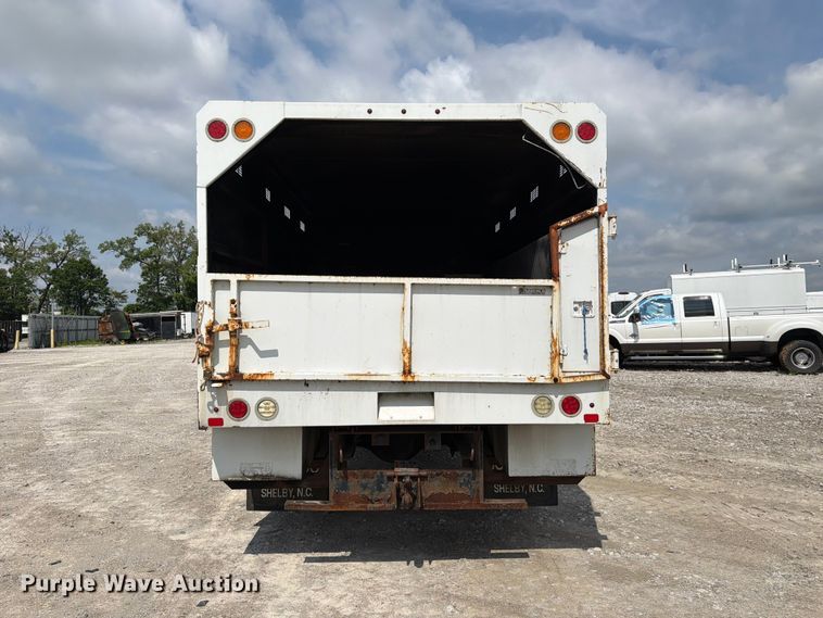 image for item YA3709 2015 Ford F650 Super Duty Ext. Cab chipper truck