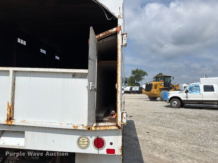image for item YA3709 2015 Ford F650 Super Duty Ext. Cab chipper truck
