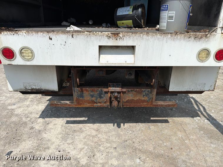 image for item YA3709 2015 Ford F650 Super Duty Ext. Cab chipper truck