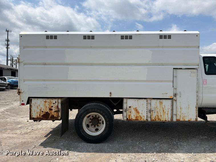 image for item YA3709 2015 Ford F650 Super Duty Ext. Cab chipper truck