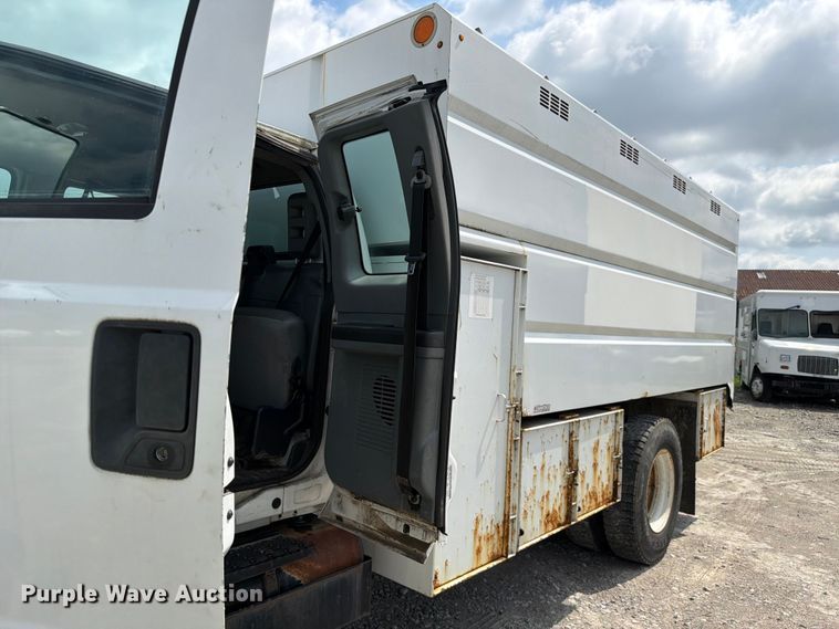 image for item YA3709 2015 Ford F650 Super Duty Ext. Cab chipper truck