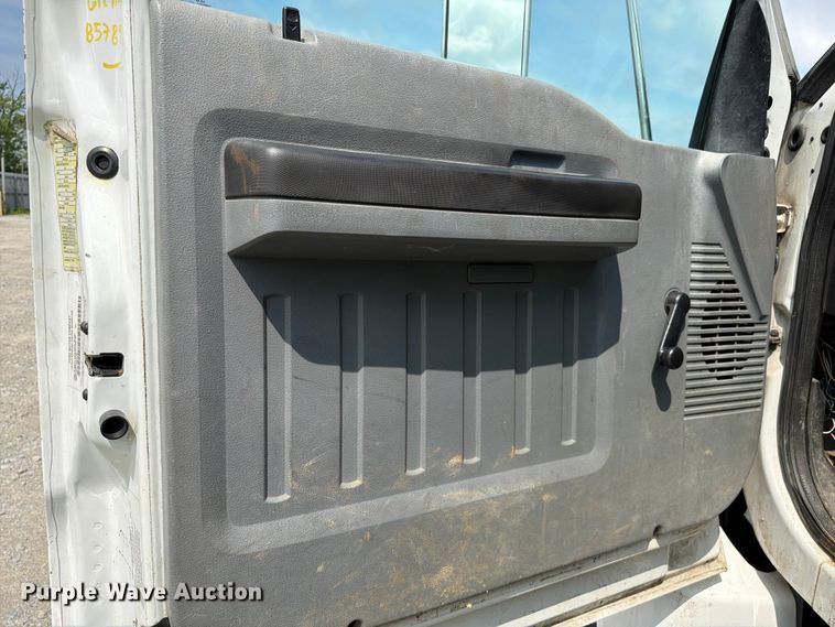 image for item YA3709 2015 Ford F650 Super Duty Ext. Cab chipper truck